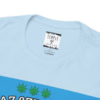Nahaufnahme des Innenlabels eines hellblauen Wahre Liebe T-Shirts der Marke Temple of Green Elixir, das Informationen zu Material (100% Baumwolle), Herkunft (Made in Dominican Republic) und Pflegeanweisungen enthält.﻿